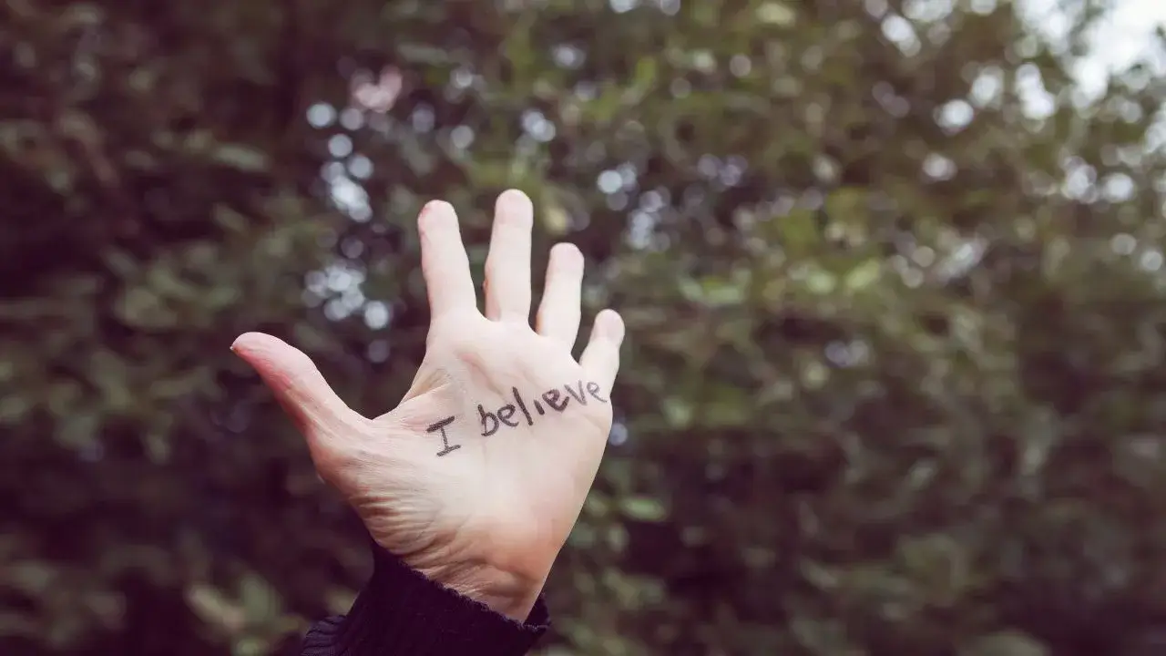 A hand that says, "I believe."